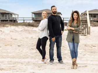 As seen on HGTV's Battle on the Beach Season 2, mentor Alison Victoria poses with her team, Corey and Paige, on the beach.  (Portrait)